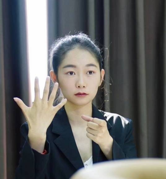 谭婷(中国首位通过司法考试聋哑人)
