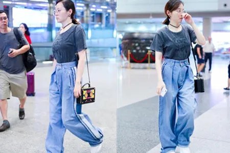 张靓颖被曝获接机 机场素颜照被吐槽太素人